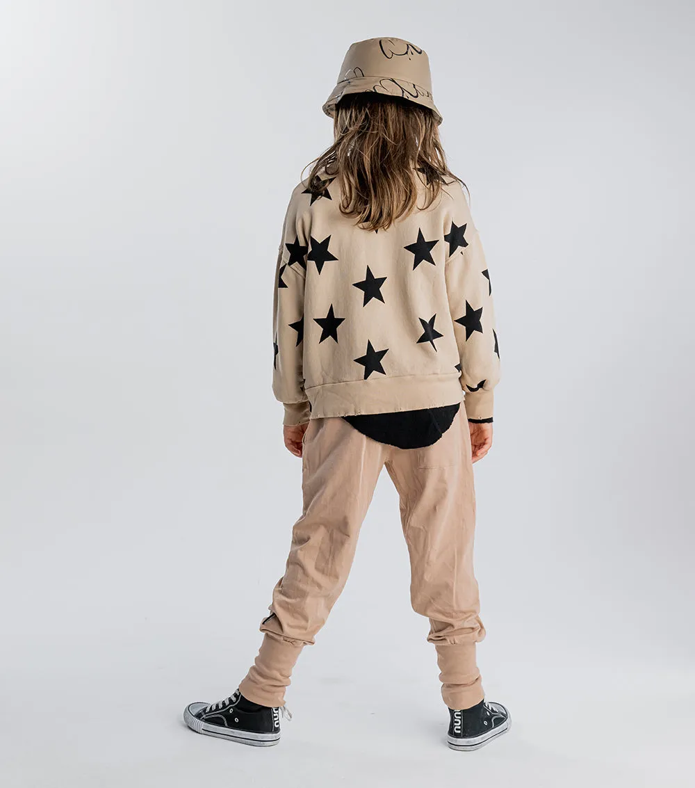 skull patch light pants